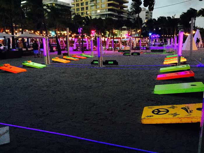 Corporate team building events, outdoor event lighting, glow volleyball, serving Florida. Events for teams and families.