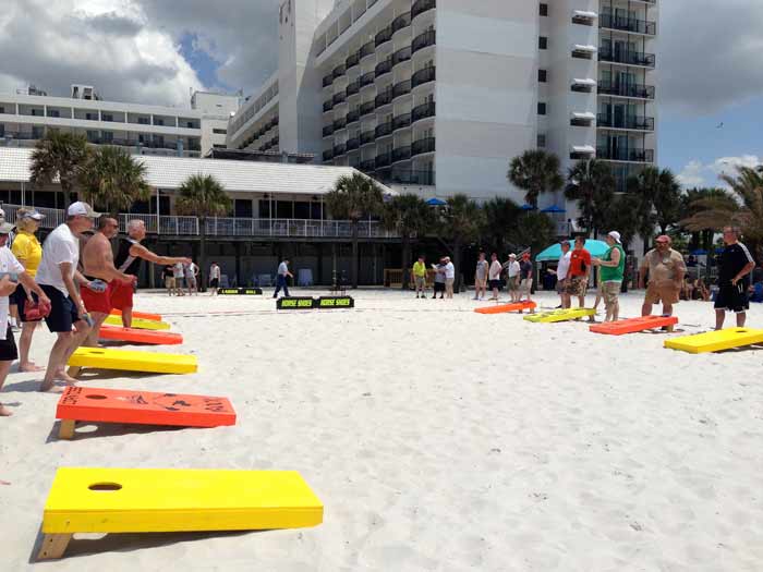 Corporate team building events, outdoor event lighting, glow volleyball, serving Florida. Events for teams and families.