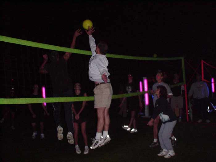 Corporate team building events, outdoor event lighting, glow volleyball, serving Florida. Events for teams and families.